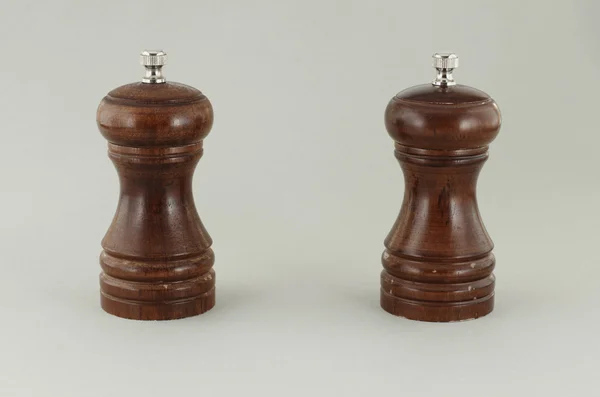 Two pepper shakers from the tree. — Stock Photo, Image