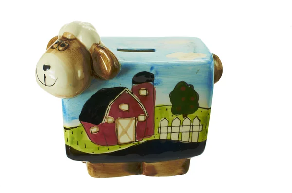 Piggy bank in de vorm van een koe. — Stockfoto