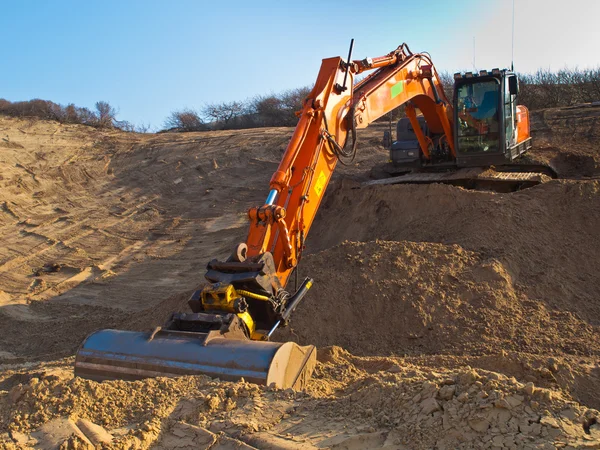 Heavy orange excavator — Stock Photo, Image