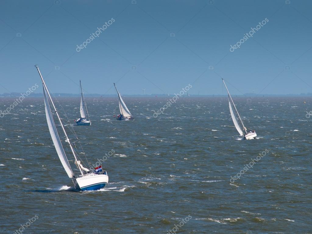 Sailing boats in strong wind — Stock Photo © CreativeNature 14719373