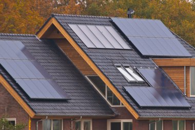 Solar panels on house clipart