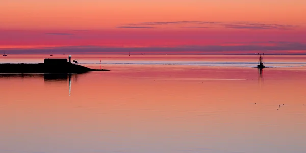 Waddenzee zonsondergang met pier — Stockfoto