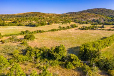 Aerial view of Causse de Blandas limestone karst highland plateau in Occitanie, France.