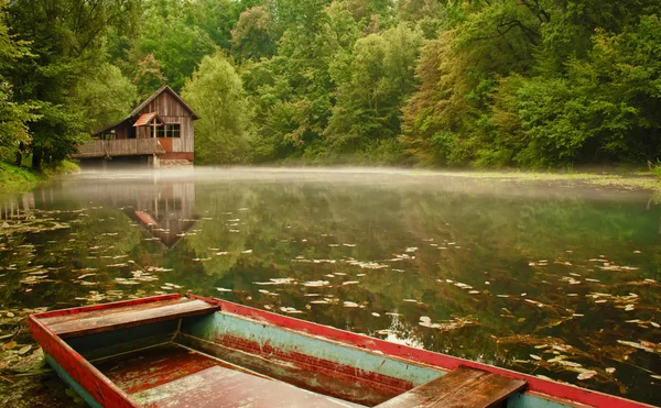 Water mill with boat — Stock Photo, Image