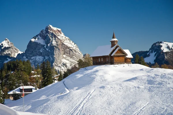 Old wooden church in Alps — Stock Photo, Image