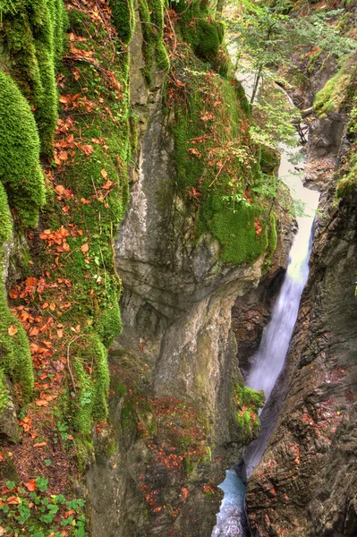 Alpine canyon in the beautiful autumn forest with Kessel Waterfall in Brandnertal valley, Voralberg, Austria, HDR — Stock Photo, Image