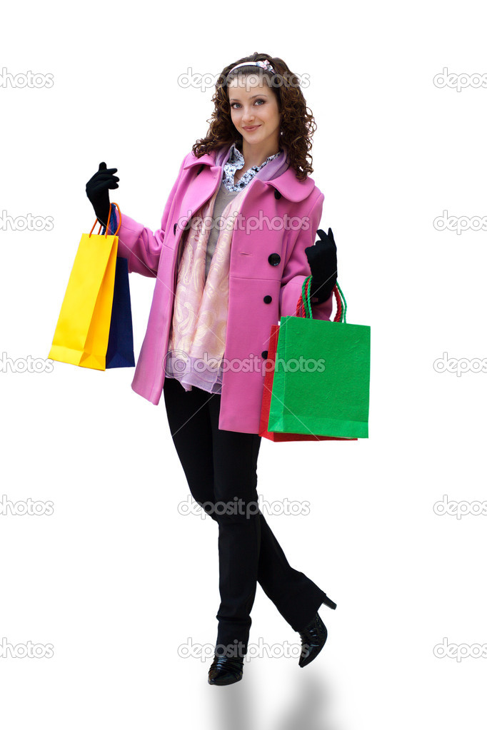 Beautiful woman with shopping bags isolated white background