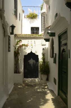 Narrow street in Tangier clipart