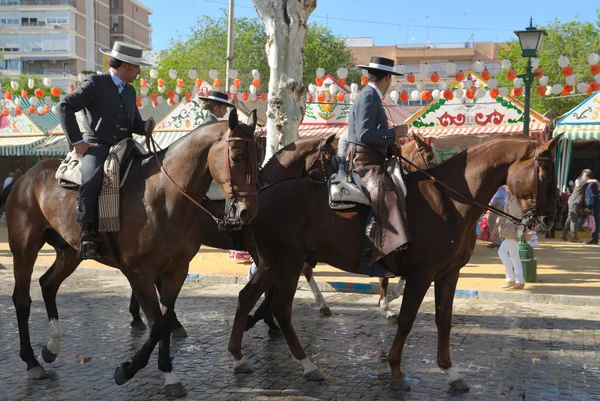 Riders at the fair in Seville — Stock Photo, Image