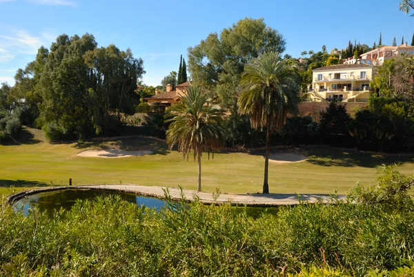 Houses in golf course — Stock Photo, Image