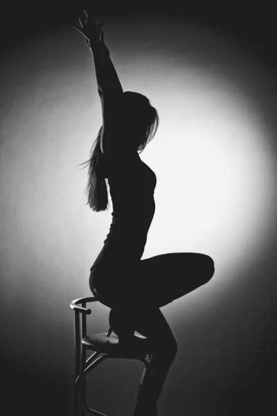 Erotic silhouette of a beautiful young woman — Stock Photo, Image