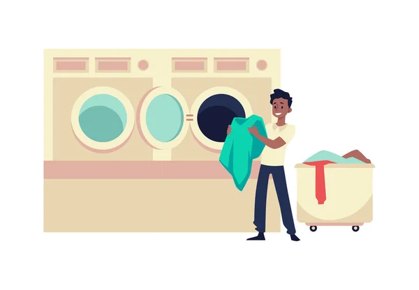 El hombre feliz saca la ropa o carga la lavadora en la lavandería pública - ilustración vectorial plana aislada — Archivo Imágenes Vectoriales