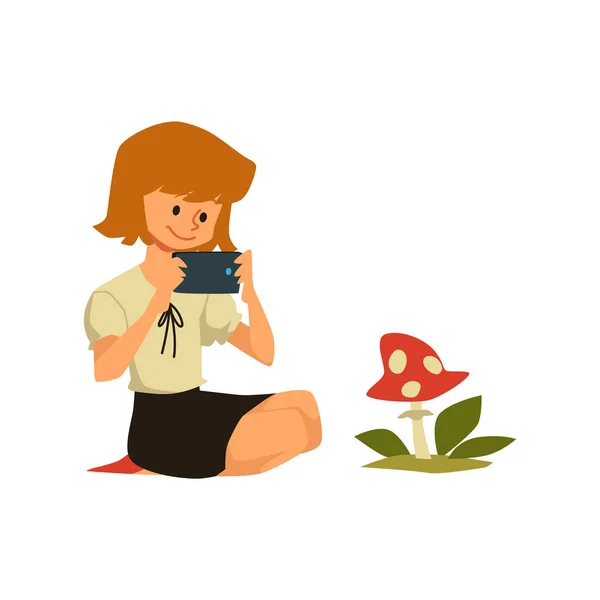 Девочка держит телефон и фотографирует гриб, плоский вектор иллюстрации изолированы на белом фоне. — стоковый вектор