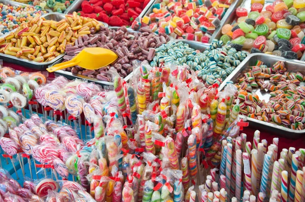 Mix of jello candy and lollipops — Stock Photo, Image