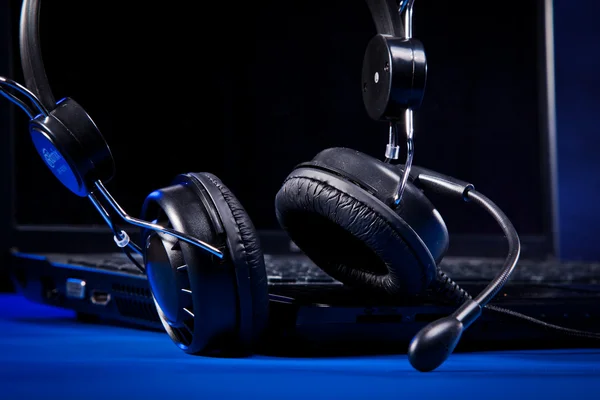 Headphones on the blue background — Stock Photo, Image