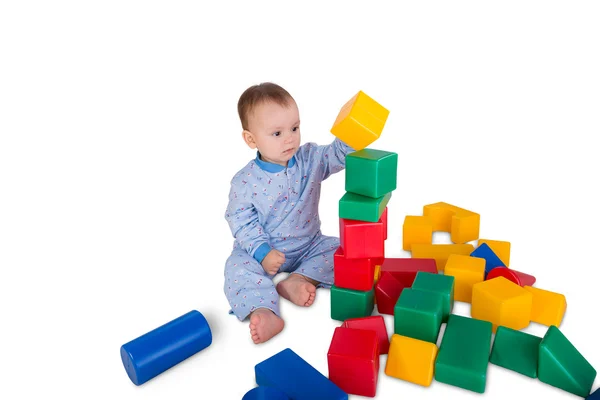 Child with plastic blocks and cubes — Stock Photo, Image