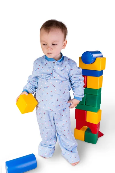 Criança com blocos de plástico e cubos — Fotografia de Stock
