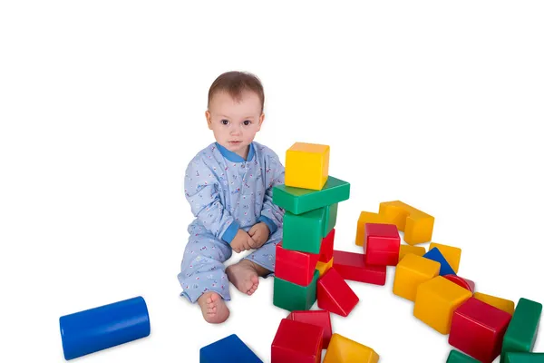 Child with plastic blocks and cubes — Stock Photo, Image
