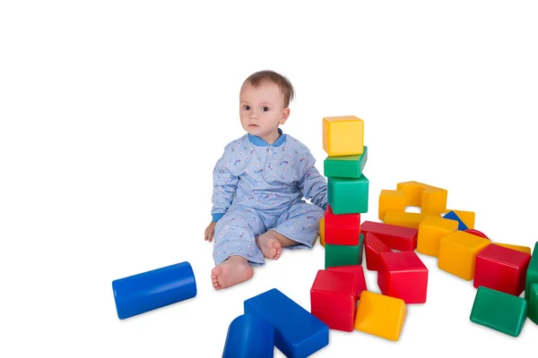 Child with plastic blocks and cubes — Stock Photo, Image