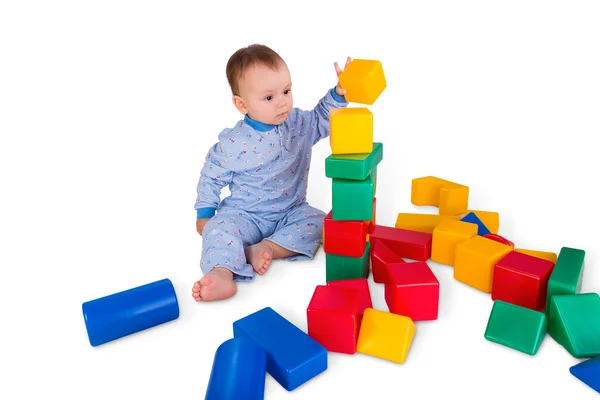 Child with plastic blocks and cubes — Stock Photo, Image