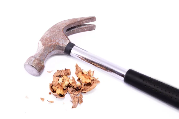 Walnut crushed by a hammer — Stock Photo, Image