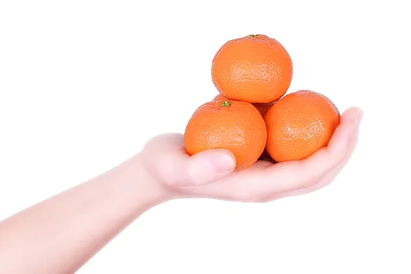 Mano che tiene mandarino — Foto Stock