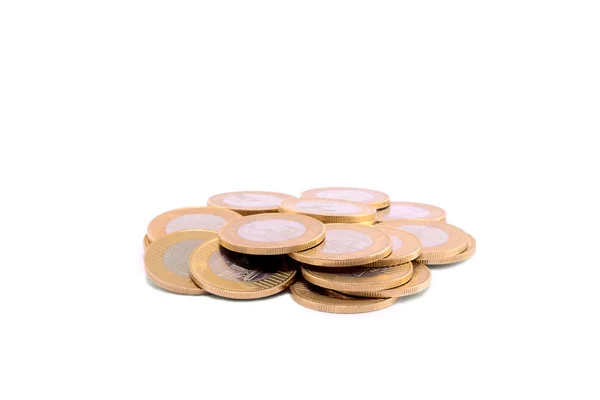 Stapel von Münzen isoliert auf einem weißen — Stockfoto