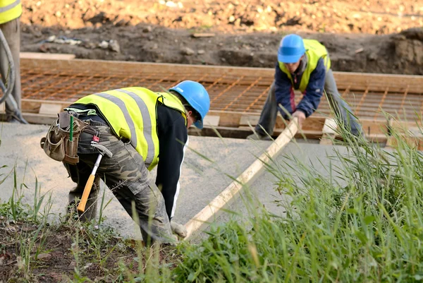 Werknemers in de bouw weg — Stockfoto