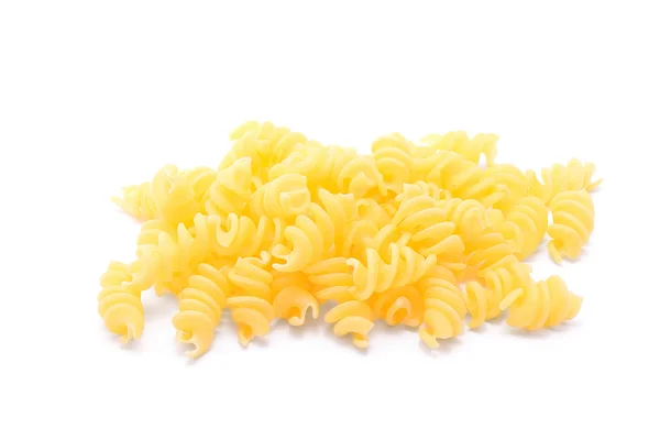 Raw spiral pasta isolated on a white — Stock Photo, Image