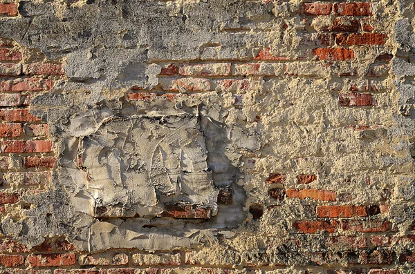 Alte verwitterte Ziegelmauer — Stockfoto