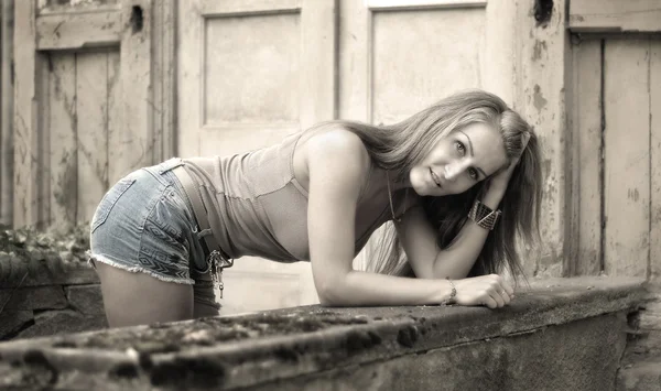 Woman posing on stairs — Stock Photo, Image