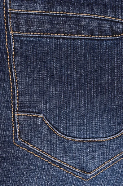 Foto de um detalhe de calça azul — Fotografia de Stock