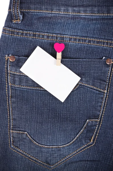 Sticker in pocket jeans — Stock Photo, Image