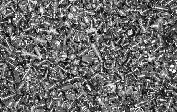Metal screws background — Stock Photo, Image