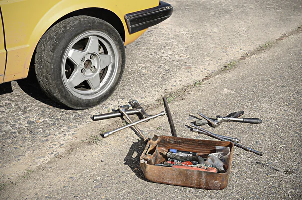 Tool kit on the asphalt — Stock Photo, Image