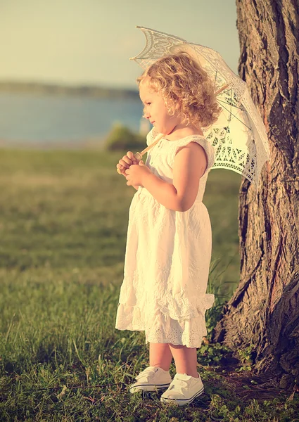 Vintage photo of a beautiful young girl — Stock Photo, Image