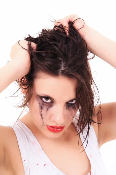 Crying young woman with flowed mascara — Stock Photo, Image