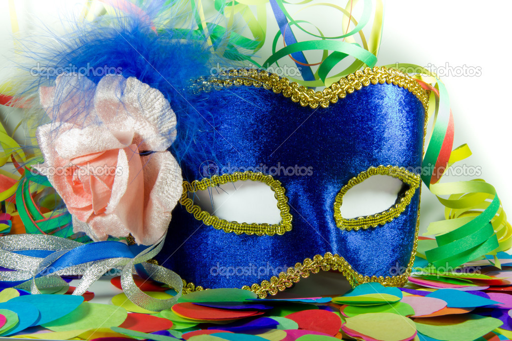 carnival mask in confetti and streamers