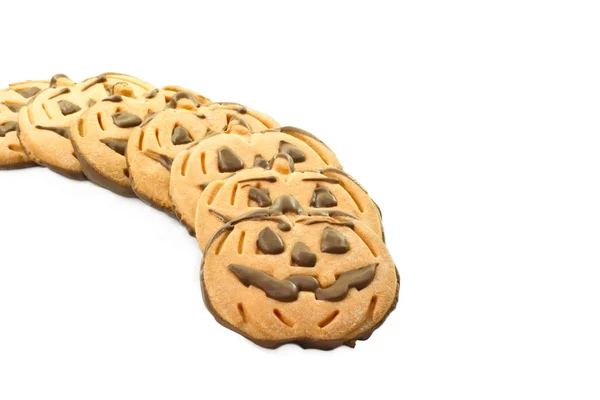 Galletas de chocolate de Halloween en forma de calabaza sobre fondo blanco —  Fotos de Stock