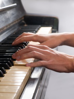 Pianist Playing Old Piano clipart