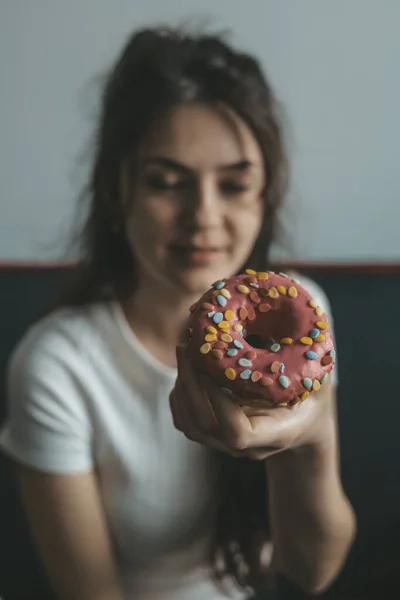 Close Portrait Pleased Pretty Girl Eating Donuts — стоковое фото