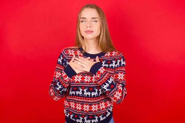 Young Caucasian Girl Wearing Christmas Sweater Smiling Hands Chest Closed — Stock Photo, Image