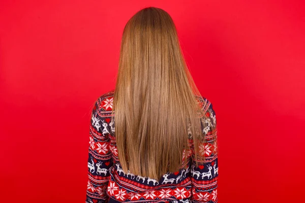 Back View Young Caucasian Girl Wearing Christmas Sweaters Red Background — Stock Photo, Image