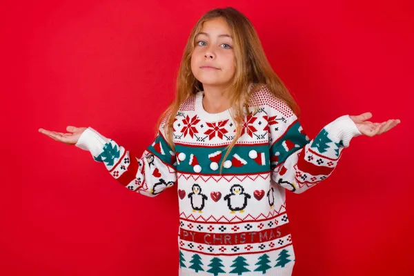Careless Attractive Brunette Kid Girl Knitted Sweater Christmas Red Background — Stock Photo, Image