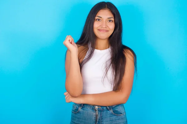 Cheerful Young Hispanic Girl Wearing White Tank Top Blue Background — Fotografia de Stock