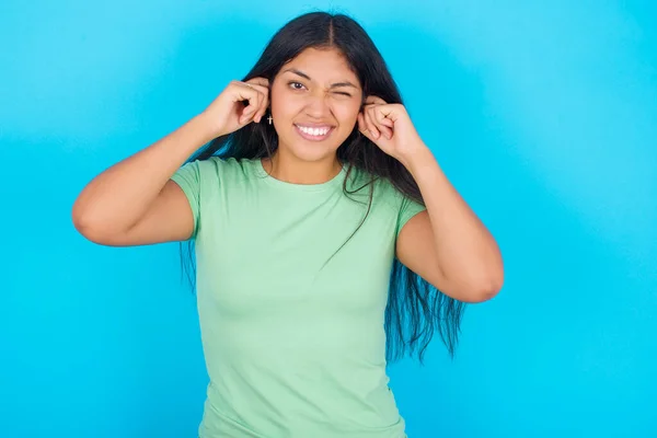 Happy Young Hispanic Girl Wearing Green Shirt Blue Background Ignores — Foto Stock