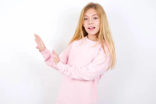 Displeased Beautiful Caucasian Little Girl Wearing Pink Sweater White Background — Stock Photo, Image