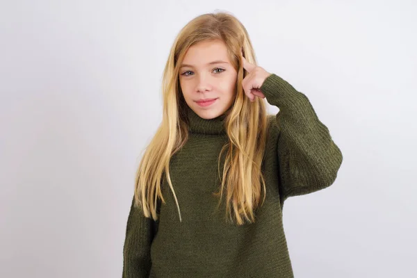 Caucasian Kid Girl Wearing Green Knitted Sweater White Background Tries — Stock Photo, Image