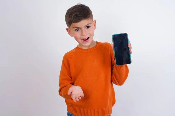 Caucasian Kid Boy Wearing Knitted Orange Sweater Standing White Background — Stock Photo, Image