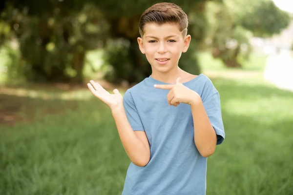 Beautiful Caucasian Little Kid Boy Wearing Blue Shirt Standing Outdoors — Stock Photo, Image